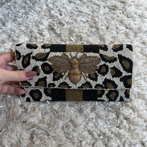 Brand new fold over clutch bag